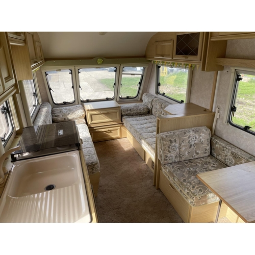 398 - A 1994 Bailey Discovery SE CHAMPAGNE touring caravan. One family owner from new, all internal applic... 