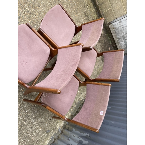 46 - A set of four mid century teak framed chairs