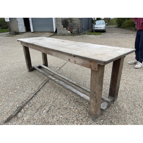 54 - A long antique pine laundry table  233x68x80