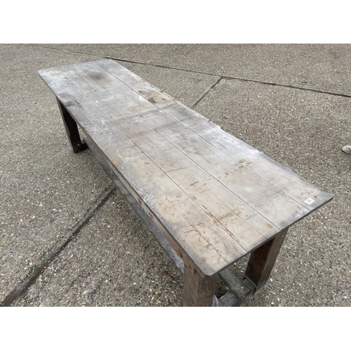 54 - A long antique pine laundry table  233x68x80