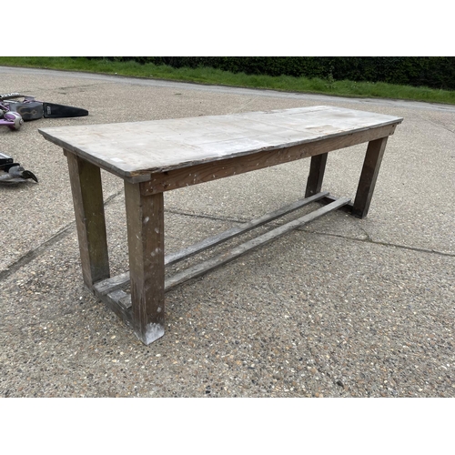 54 - A long antique pine laundry table  233x68x80