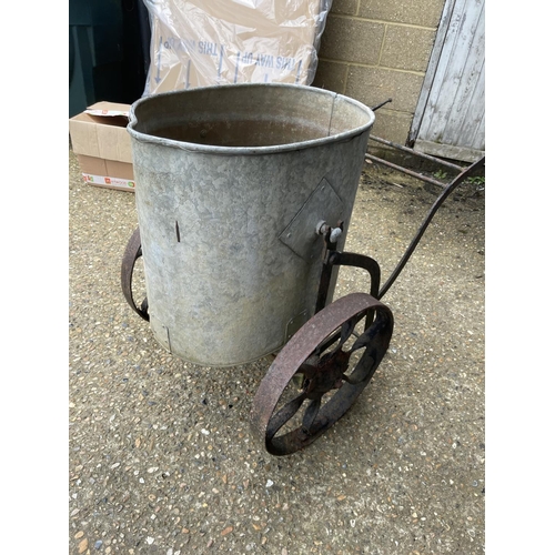 6 - A vintage iron water carrier with galvanised drum