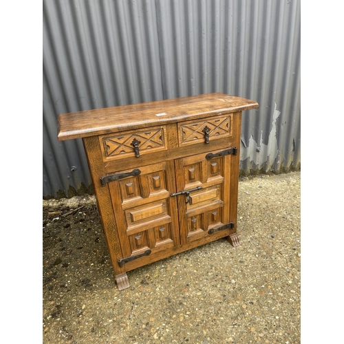 7 - A Dutch oak two drawer cupboard