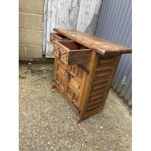 7 - A Dutch oak two drawer cupboard