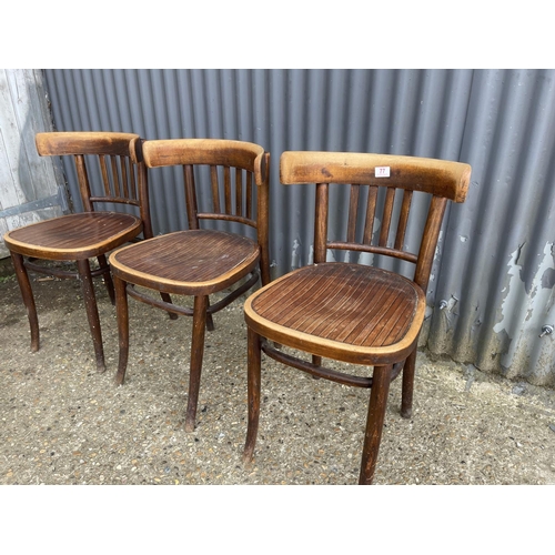 77 - A bentwood carver and three bentwood chairs