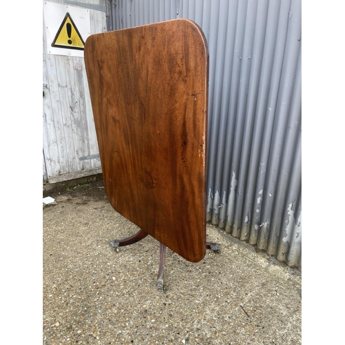 80 - A large Victorian mahogany tilt top breakfast table, one leg AF