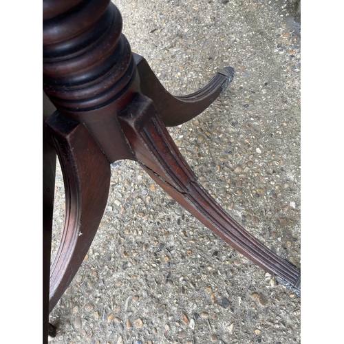 80 - A large Victorian mahogany tilt top breakfast table, one leg AF