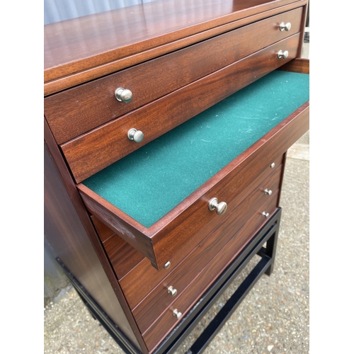 87 - A hardwood eight drawer collectors chest of drawers on stand, each drawer lined with green baize 77x... 