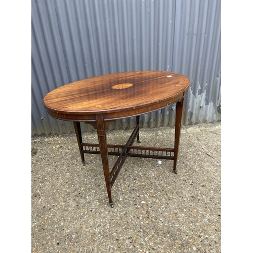 93 - An Edwardian inlaid oval occasional table 100x70