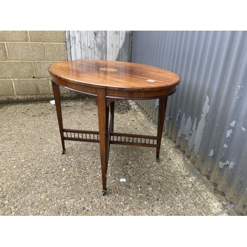 93 - An Edwardian inlaid oval occasional table 100x70