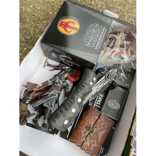 95 - A box of Star Wars items and box of dvd etc