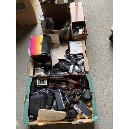 1001 - Three boxes of cameras, cases and photographic sundries