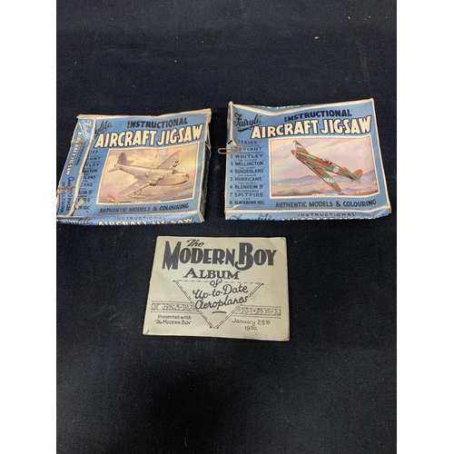 470 - Two Fairylite Aircraft jigsaws and The Modern Boy Album of up to date aeroplanes January 25th 1930