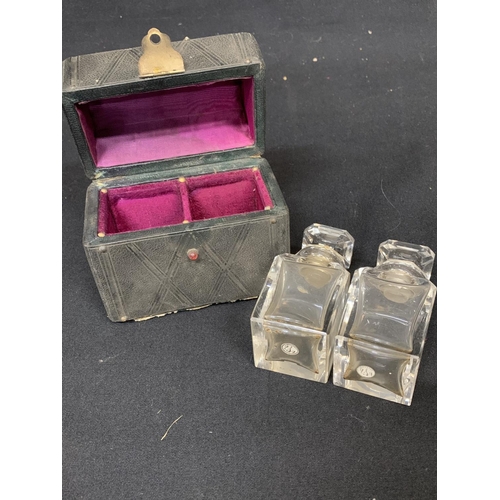 482 - Pair of Square Cut Baccarat Scent Bottles in studded leather case each bottle with original paper la... 