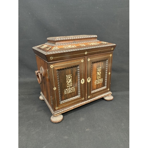 732 - A Regency Rosewood and Mother of Pearl lnlaid Ladies Table cabinet fitted with workbox, jewellery dr... 