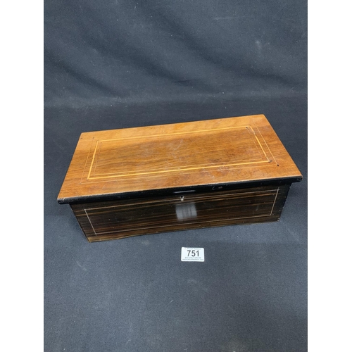 751 - A Victorian musical box playing six tunes, size 37 x 18 x 12 cms, in working order