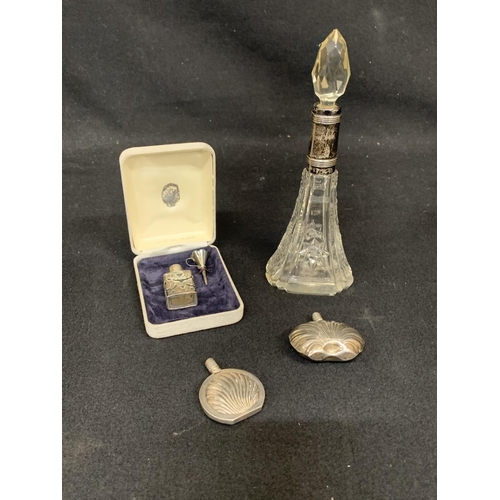 773 - Silver mounted scent bottle and three sterling silver scent bottles