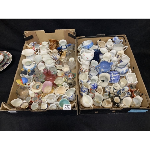 777 - Two trays of assorted small decorative jugs (2)