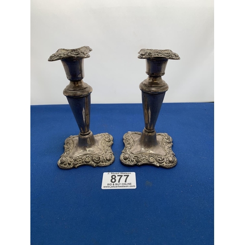 877 - Pair of hallmarked Silver candlesticks height 13 cms