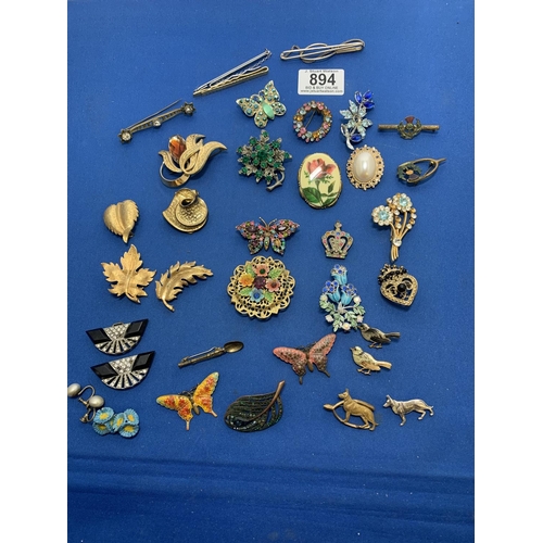 894 - Collection of costume brooches and tie pins