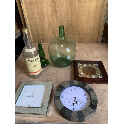 948 - Small carboy, two bottles and three clocks