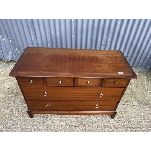 100 - A stag minstrel chest of six drawers