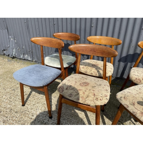 110 - A set of six mid century teak dining chairs