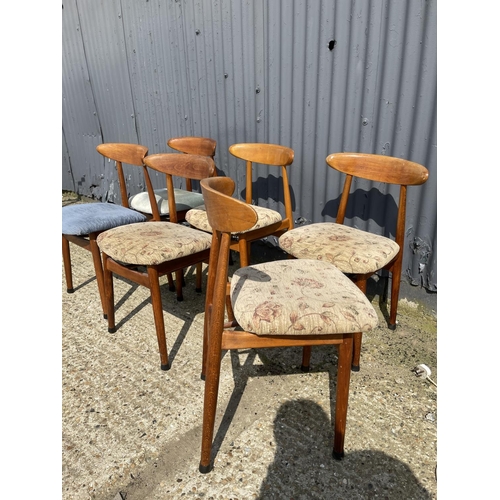 110 - A set of six mid century teak dining chairs