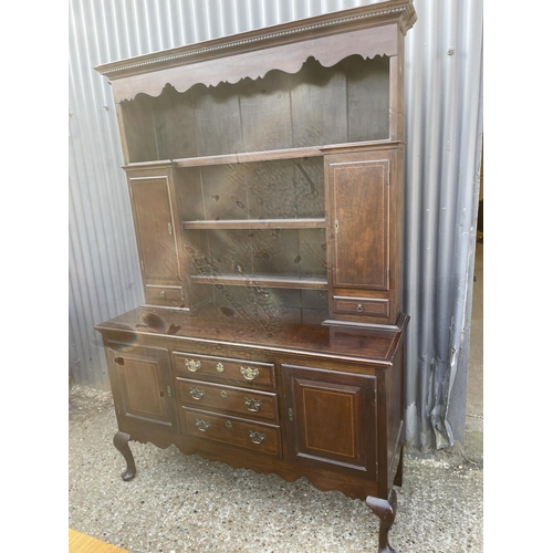 115 - An inlaid mahogany dresser