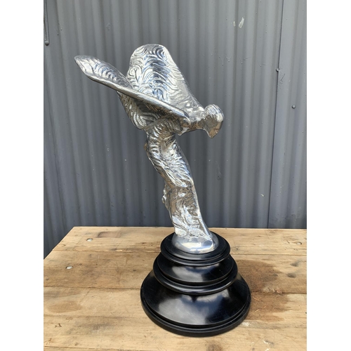 125c - A heavy chrome plated metal Spirit of Ecstasy Flying Lady Figure on solid black stone base height 68... 