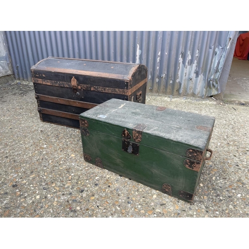 135 - A vintage dome top trunk together with a wooden trunk