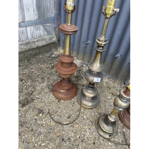 14 - Five assorted rustic brass and metal lamps