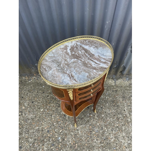 151 - An Italian style inlaid oval occasional table with white marble top