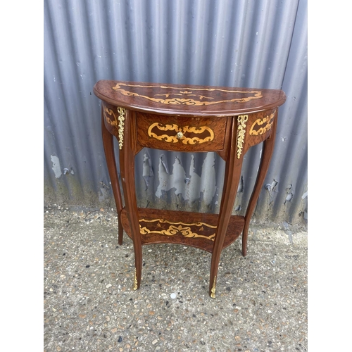 154 - An Italian style single drawer demi lune table