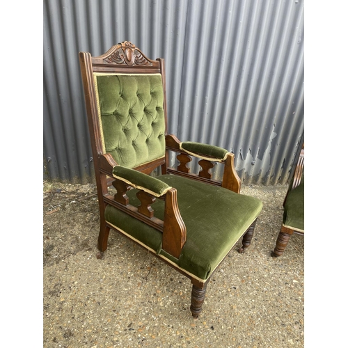 18 - A ladies and gents pair of edwardian green upholstered salon armchairs