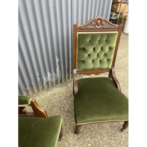 18 - A ladies and gents pair of edwardian green upholstered salon armchairs