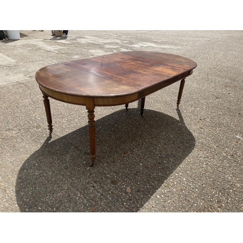 25 - A victorian walnut 6 leg pull out dining table with two extension leaves (capacity for 4 or 5) curre... 