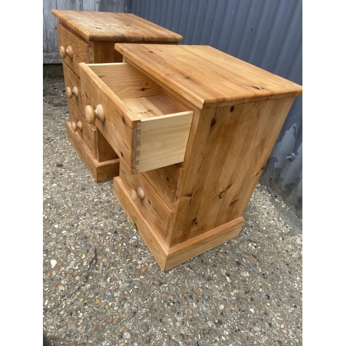 3 - A pair of country pine three drawer bedside chests of three 40x36x60