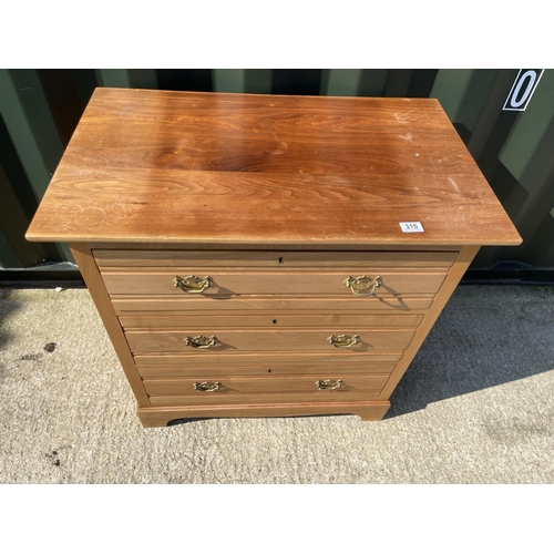 315 - A satinwood chest of three drawers