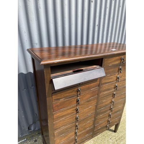 35 - A early 20th century oak specimen / music cabinet with drop fronts 93x35x110