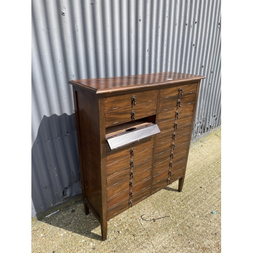 35 - A early 20th century oak specimen / music cabinet with drop fronts 93x35x110