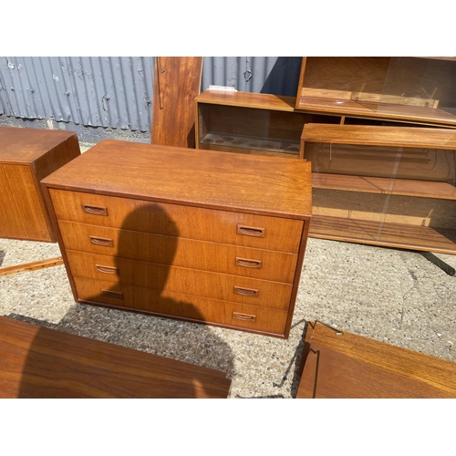 36 - A large danish teak wall furniture system, including two chests, two workstations, bureau, 3 cabinet... 