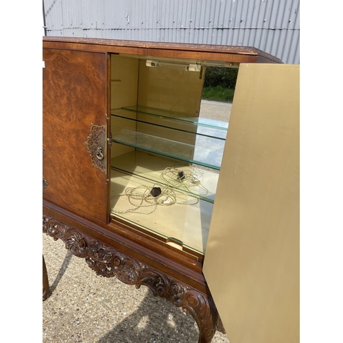 37 - A large walnut cocktail drinks cabinet 105x45x156.