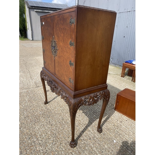 37 - A large walnut cocktail drinks cabinet 105x45x156.