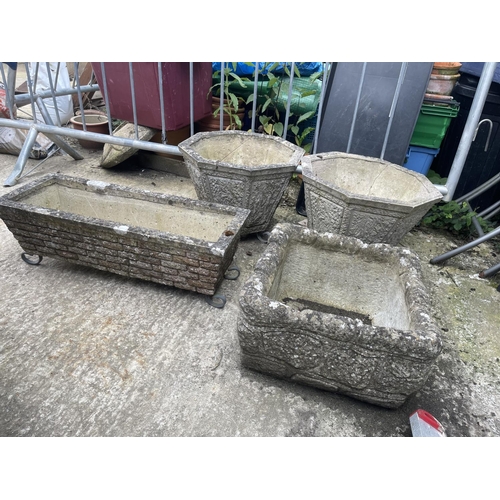 440q - Four concrete planters assorted shapes