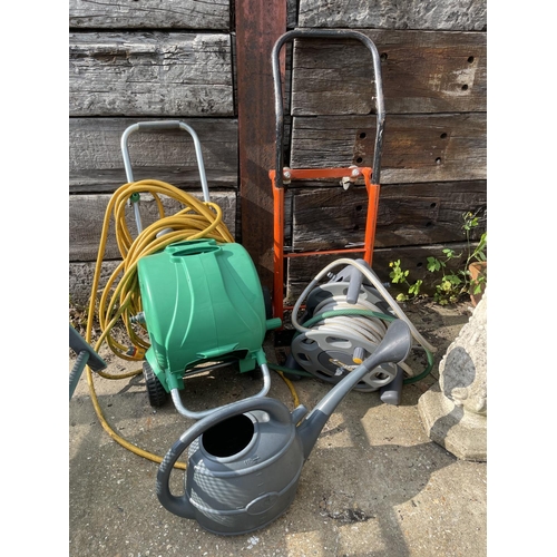 440w - Two hose reels, water can and barrow