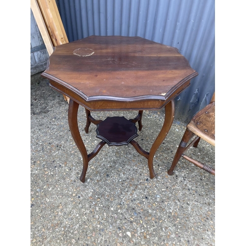 47 - A mahogany occasional table, brass framed mirror and chair