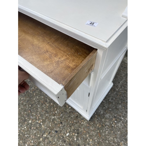 48 - An oak linen fold dresser painted white