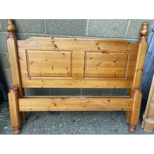 55 - A solid pine double bed frame