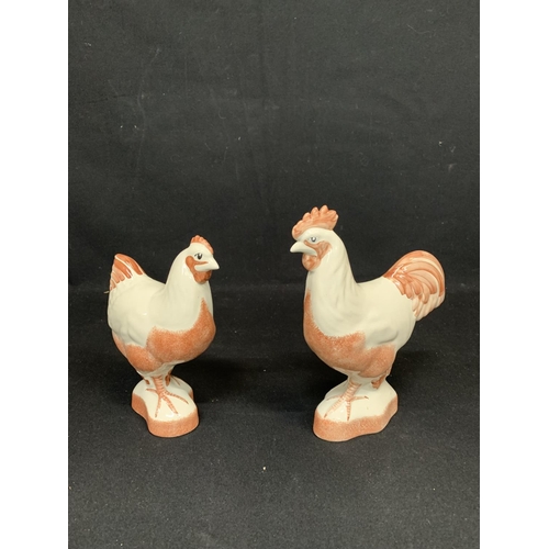 688 - Pair Rye pottery rooster and hen figures, tallest 20cms, signed